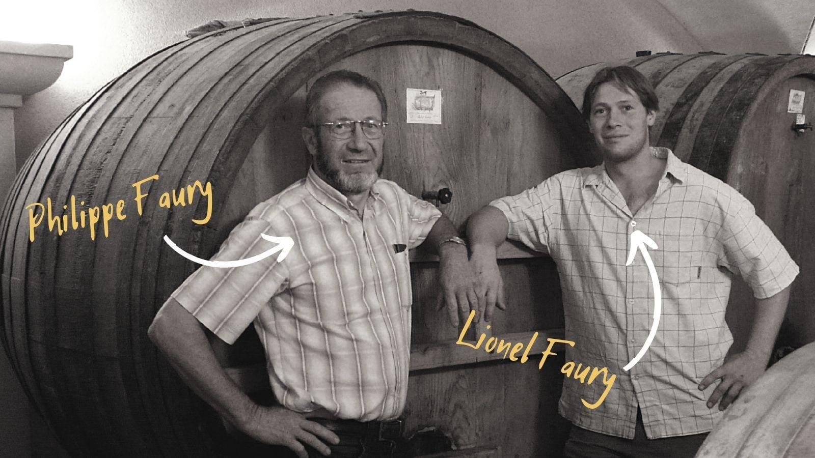 Lionel and Philippe Faury beside a barrel at the domaine in Chavanay